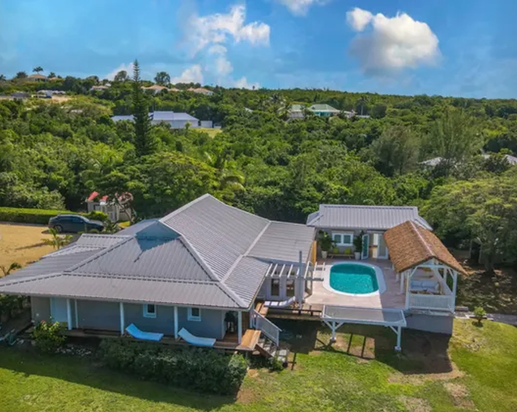 An aerial view of the villa and garden